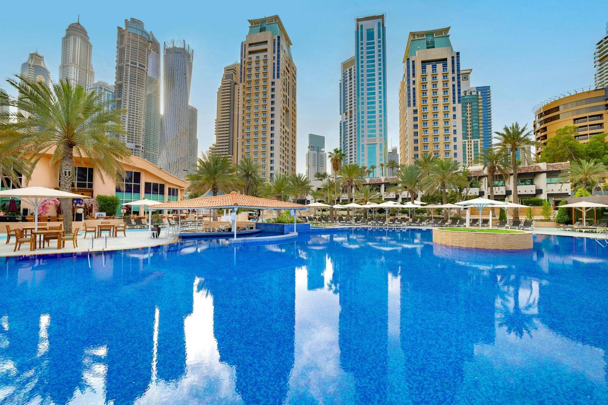 Al Habtoor Grand Resort, Autograph Collection Dubai Exterior foto The swimming pool at Jumeirah Beach Hotel